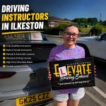 Driving Instructors in Ilkeston – Elevate Driving School pupil celebrating her driving test pass with a fully qualified driving instructor.
